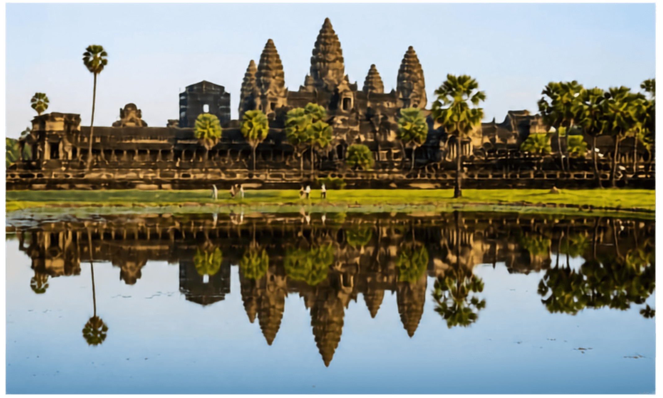 Angkor Wat and its reflection in the surrounding moat at sunrise, Cambodia.